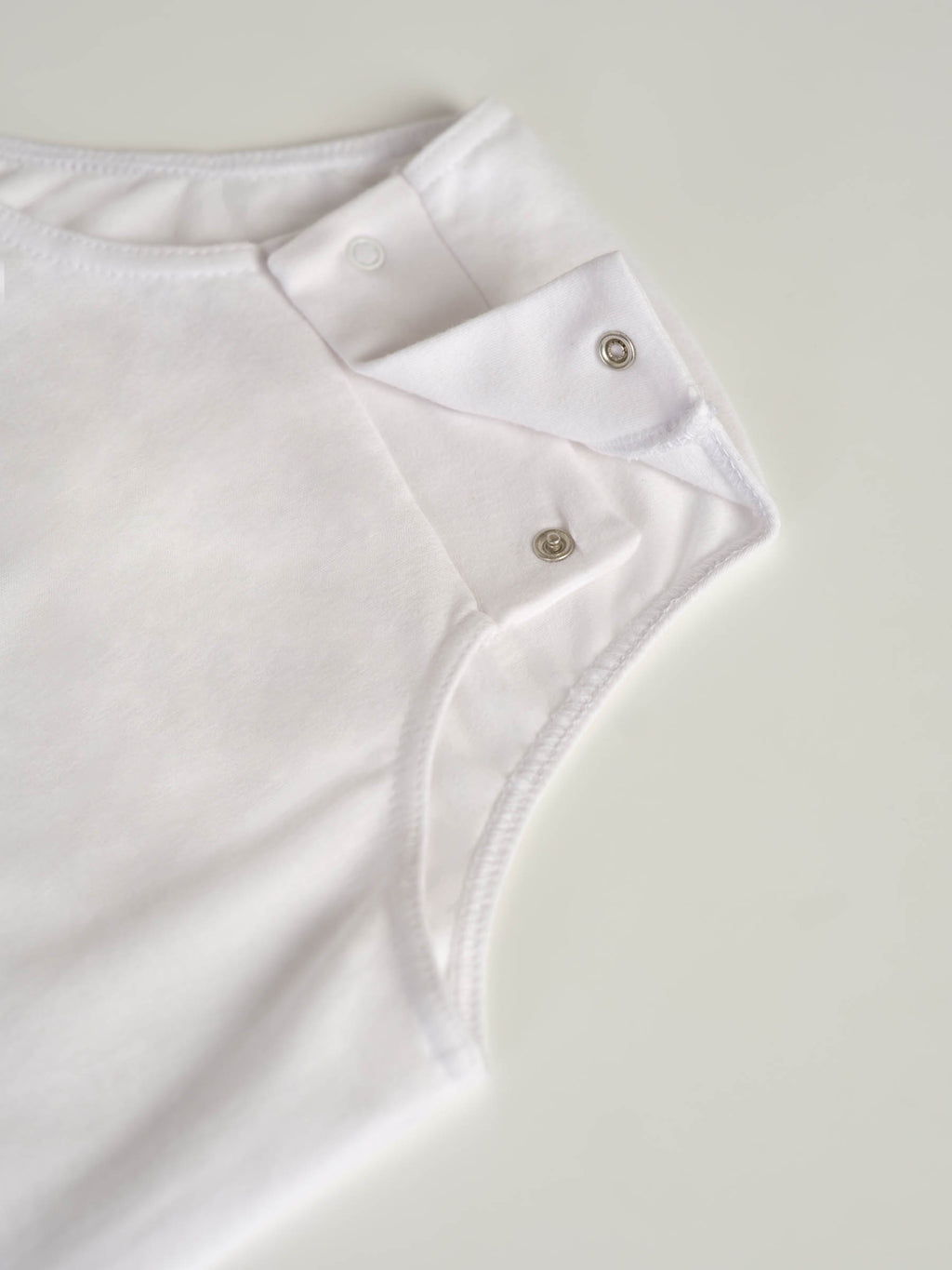 Bodysuit med trykknapper i skrittet (2010)